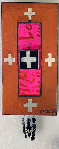 an orange and pink painting with a cross on it